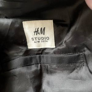 Fun black blazer with blue reflective detail